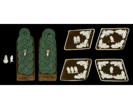 German Second World War Private Forestry Service Insignia. A matched pair of green over brown velvet Oberforsters shoulder bo
