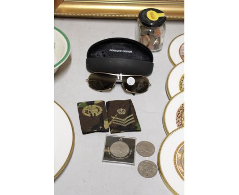 A PAIR OF PORSCHE DESIGN SUNGLASSES, TWO MILITARY EPAULETTES, COMMEMORATIVE CROWNS AND A JAR OF MIXED COINS