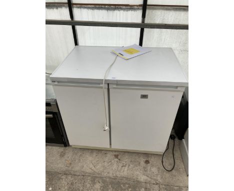 A WHITE ZANUSSI SIDE BY SIDE UNDER COUNTER FRIDGE FREEZER