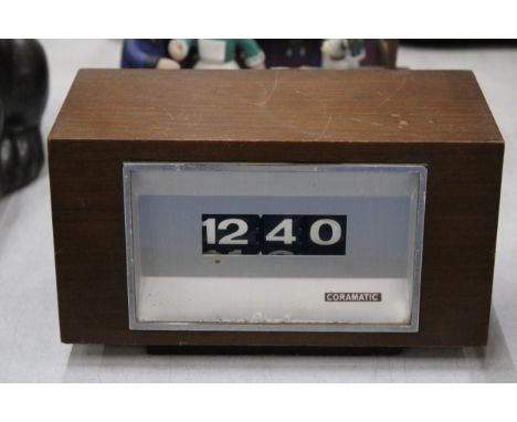 A VINTAGE CORAMATIC TICKET CLOCK