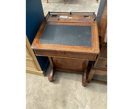 AN EDWARDIAN WALNUT AND INLAID DAVENPORT WITH FOUR SIDE DRAWERS, FOUR SHAM DRAWERS AND BRASS GALLERY BACK, 22" WIDE