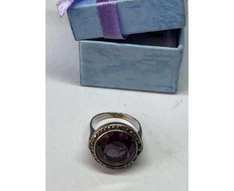 A VINTAGE MARKED SILVER ART DECO MARCASITE AND AMETHYST RING  SIZE N IN A PRESENTATION BOX
