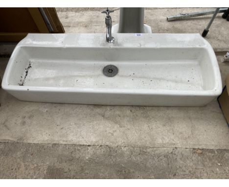 A LONG WHITE CERAMIC SINK WITH SINGLE TAP (L:107CM)