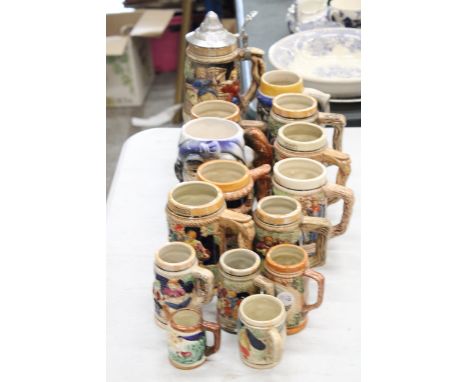 A COLLECTION OF CERAMIC STEIN TANKARDS