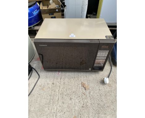 A LARGE PANASONIC MICROWAVE OVEN