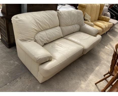 A CREAM LEATHER CONTOUR THREE SEATER SETTEE