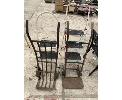TWO SETS OF STEP LADDERS AND TWO METAL SACK TRUCKS