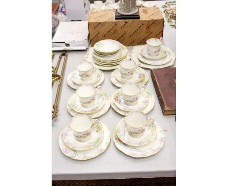 A VINTAGE PARAGON 'MERRYVALE' TEASET TO INCLUDE CAKE PLATES, CUPS, SAUCERS AND SIDE PLATES