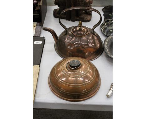 A CHRISTOPHER DRESSER STYLE COPPER KETTLE AND BRITISH COPPER BED WARMER