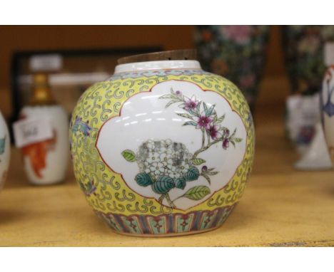 A PAIR OF CHINESE FAMILLE ROSE GINGER JARS WITH RED SEAL MARKS TO THE BASE