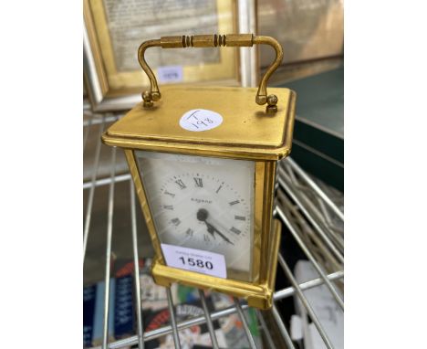 A SMALL BAYARD BRASS EFFECT CARRIAGE CLOCK