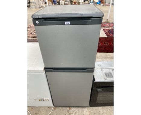 A GREY BEKO UPRIGHT FRIDGE FREEZER