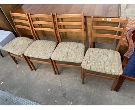 A SET OF FOUR RETRO TEAK CURVED LADDER BACK DINING CHAIRS