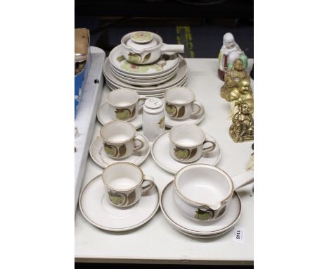 A QUANTITY OF DENBY DINNERWARE TO INCLUDE PLATES, SOUP BOWLS AND SAUCERS, A PEPPER POT AND CUPS AND SAUCERS