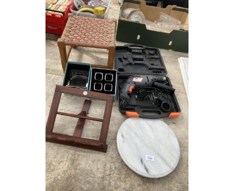 AN ASSORTMENT OF ITEMS TO INCLUDE NAPKIN RINGS, A DRILL AND A STIRUP PICTURE FRAME