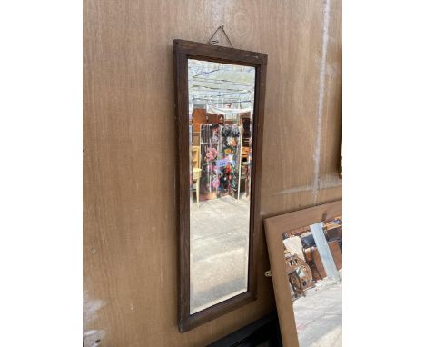 AN OAK BEVEL EDGE WALL MIRROR, 34" X 12.5"