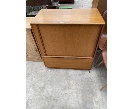 A RETRO TEAK TURNIDGE OF LONDON TAMBOUR VIDEO UNIT, 32.5" WIDE