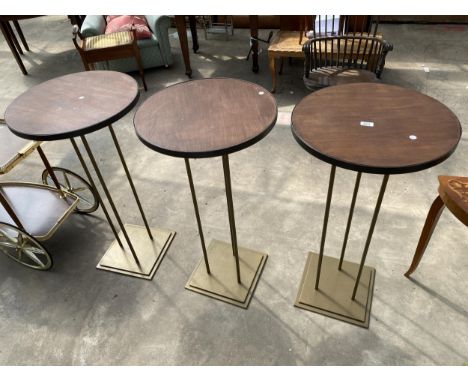THREE TALL PUB TABLES ON METALWARE BASE AND LEGS 20" DIAMETER.