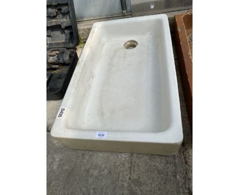 A DECORATIVE LOW WHITE BELFAST STYLE SINK