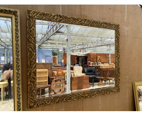 A GILT FRAMED BEVEL EDGE WALL MIRROR, 46" X 36"