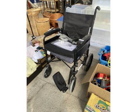 A LOMAX FOLDING WHEELCHAIR