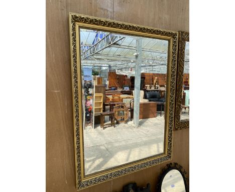 A GILT FRAMED WALL MIRROR WITH BEVEL EDGE, 45" X 35"