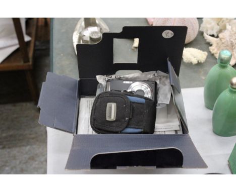 A PANASONIC LUMIX F55 BOXED CAMERA WITH INSTRUCTIONS