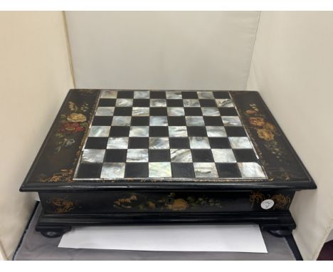 A VICTORIAN EBONY GAMES BOX WITH AN INLAID MOTHER OF PEARL CHESS BOARD TO THE TOP AND BRIDGE PLAYING CARDS AND SCORING TABLET