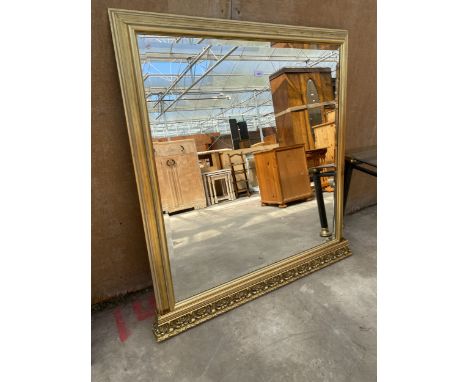 A GILT FRAMED BEVEL EDGE OVERMANTEL MIRROR 42 X 41 INCH