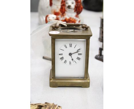 A 19TH CENTURY FRENCH CARRIAGE CLOCK WITH TWO KEYS