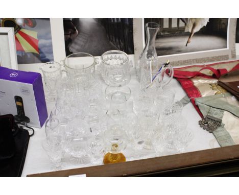 A QUANTITY OF CUT GLASS GLASSES TO INCLUDE BRANDY BALLOONS, SHERRY, WHISKY TUMBLERS, ETC PLUS WINE BOTTLE COOLERS, BABYCHAM G