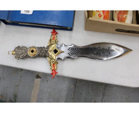 A FANTASY DAGGER WITH DECORATIVE HANDLE