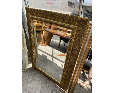 A GILT FRAMED BEVEL EDGE WALL MIRROR, 47" X 34"