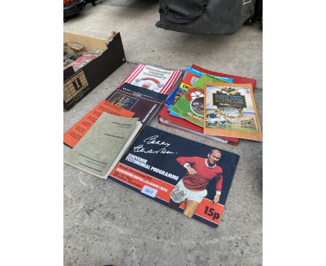 AN ASSORTMENT OF FOOTBALL PROGRAMMES TO MAINLY INCLUDE MANCHESTER UNITED