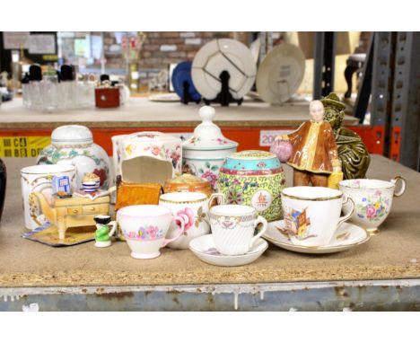A MIXED LOT TO INCLUDE AN ORIENTAL STAFFORDSHIRE FIGURE, SADLER TEA CADDY, CARDEW DESIGN MINIATURE TEAPOT, FLORIS CERAMIC CAN