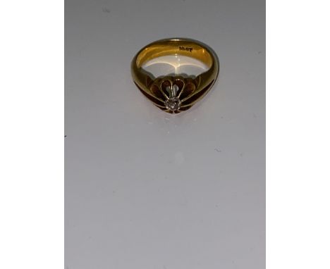 A diamond solitaire ring, set with a central old cut diamond, measuring approx. 0.10ct, stamped 18ct, ring size K.