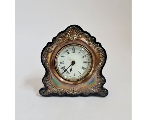 A Birmingham silver front mantle clock with leaf design. 16 1/2 cm.