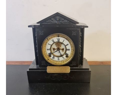 A black slate Antonia U.S.A mantle clock. Presented to Chief Constable of Banbury 1914. 28 1/2cm.