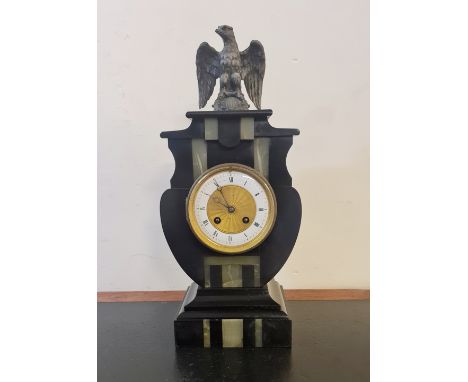 An art deco black slate and green marble Blurton of Stourbridge mantle clock with eagle to top. 40 1/2cm.