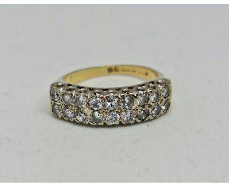 A hallmarked 18ct yellow gold diamond ring, set with two rows of round brilliant cut diamonds, total diamond weight approx. 0