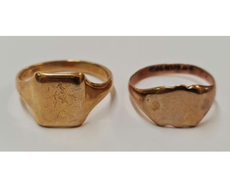 Two plain signet rings, markings rubbed, ring size R and V, approx. total weight 8g.