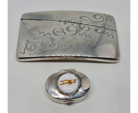 A card case, engraved with scrolling ribbon design, stamped Sterling, together with a pill box featuring enamel design of a g