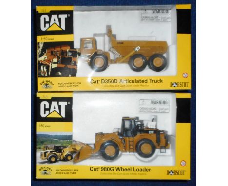 Norscot. (2) 55027 Cat 980G Wheel loader. 1:50 scale.; 55700 Cat D350D Articulated truck. 1:50 scale. Both boxed.