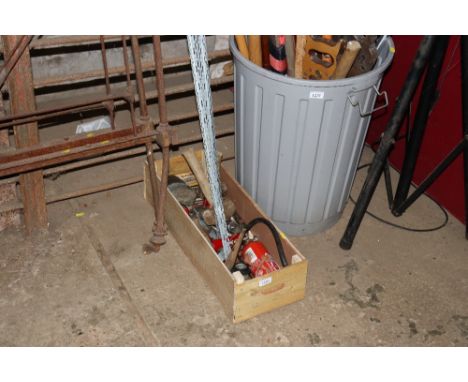 A box containing hand tools and fittings