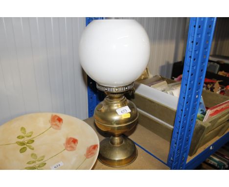 A brass oil lamp