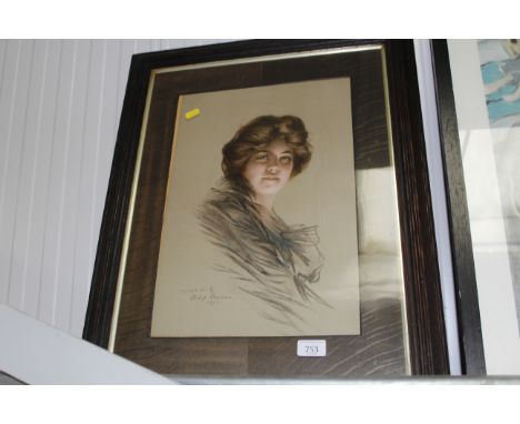An oak framed portrait print 