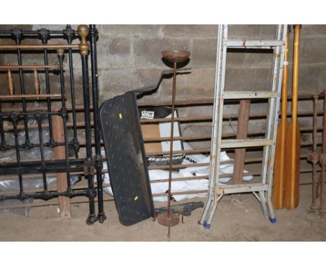 A vehicle mounted metal step and candle stand