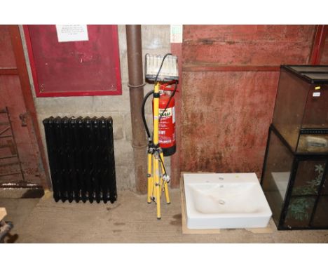 A flood light on tripod stand