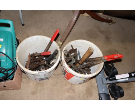 Two plastic containers with contents of hand tools 