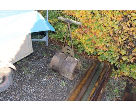 A cast iron garden roller 